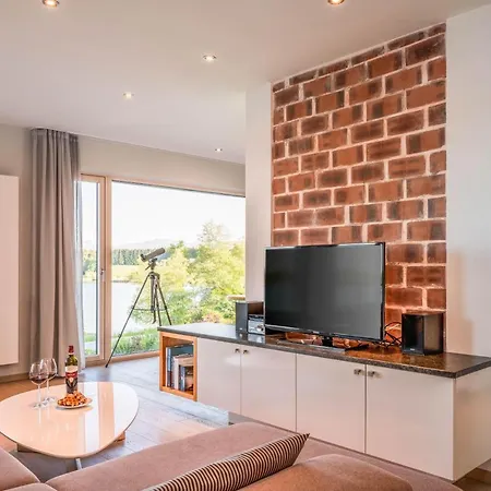 Appartement Lebensart-Am-See-Design-Ferienwohnung-Atmos-Direkt-Am-See